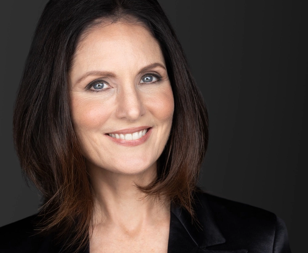 Tenley Zinke as Executive Director of Marketing